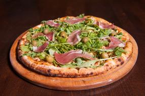 meat pizza with vegetables