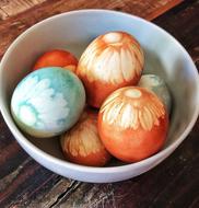colored eggs in a plate