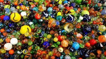 many multicolored glass marbles