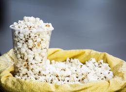 salty popcorn in a glass