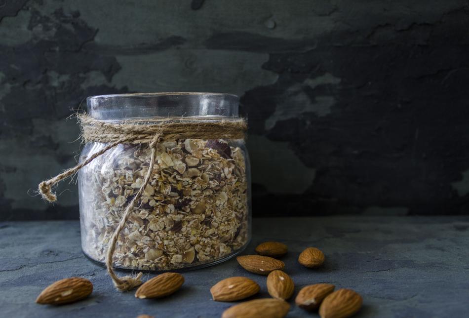 Useful nuts in a jar against the wall
