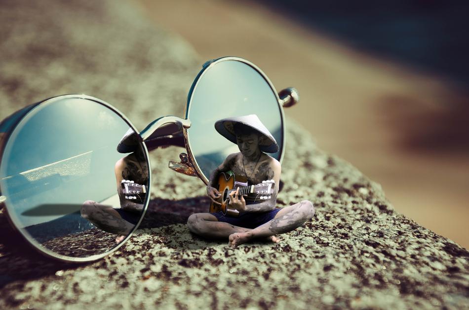 glasses with reflection beach