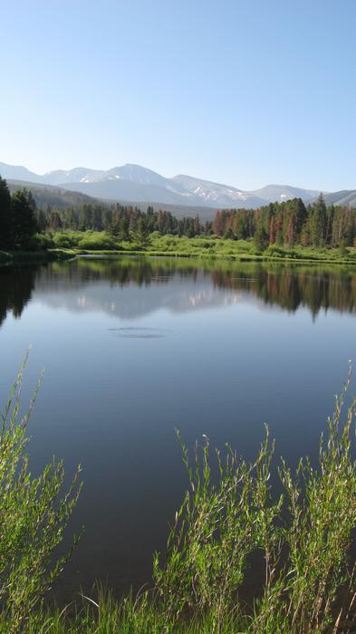 a large lake with stones