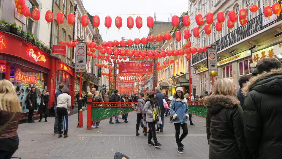 people walk around the square