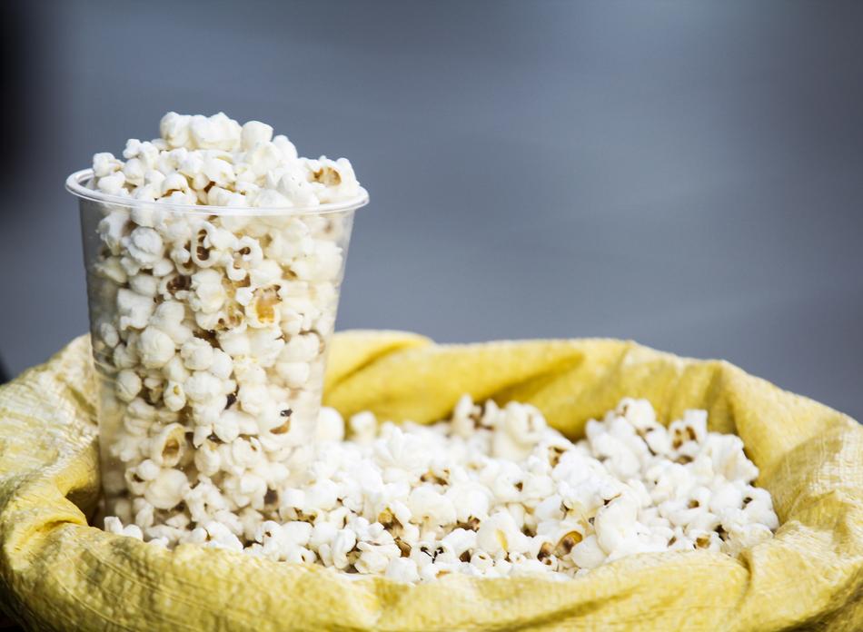 salty popcorn in a glass