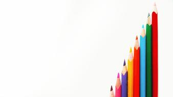 Stairs of the colorful, wooden pencils, at white background