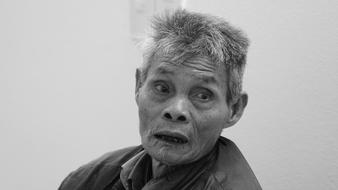 black and white, elderly man from Vietnam