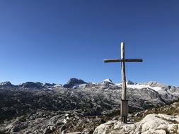 the cross is white on a blue sky background