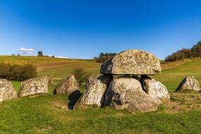 stone sculptures by the grass