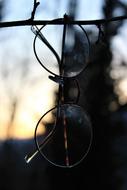 glasses on the fence