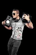 Young man with speakers and headphones