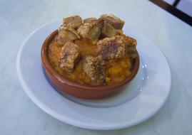 bowl of meat in sauce