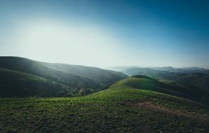 the green field hill is beautiful