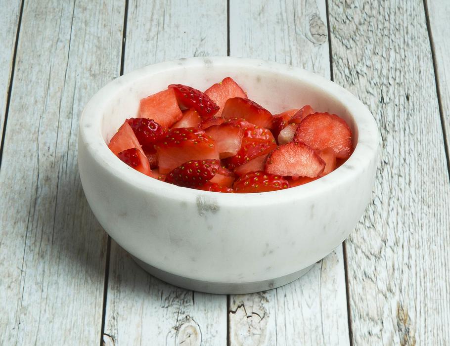 finely chopped strawberries in a bowl