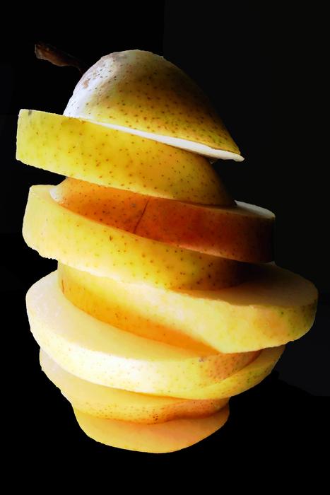 Sliced fruit on a black background