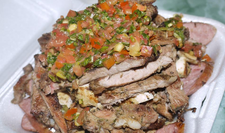 sliced meat with spices and vegetables