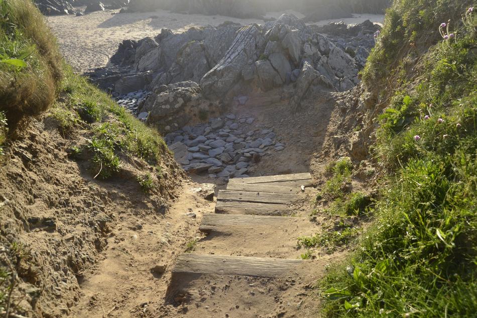 sandy road to the rocks landscape
