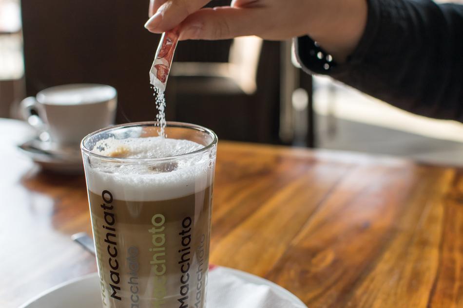Adding sugar to coffee