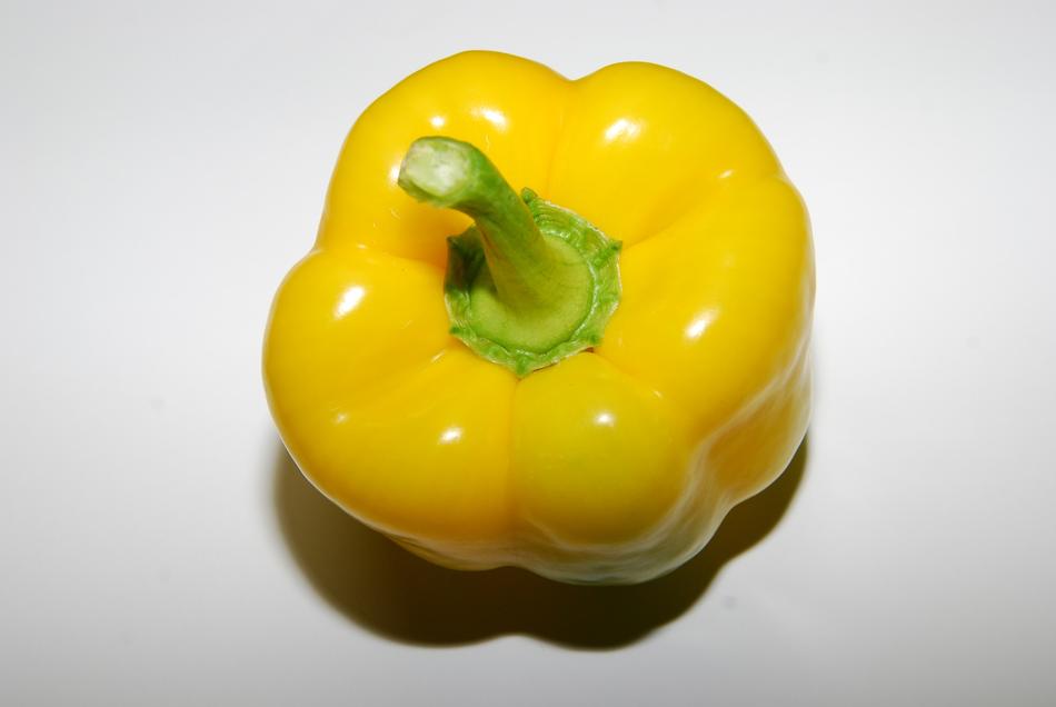 yellow healthy peppers on a white plate