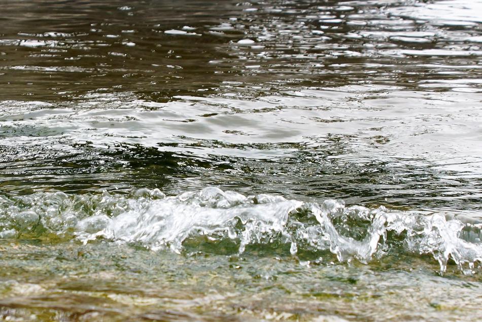 the waves in the lake are white