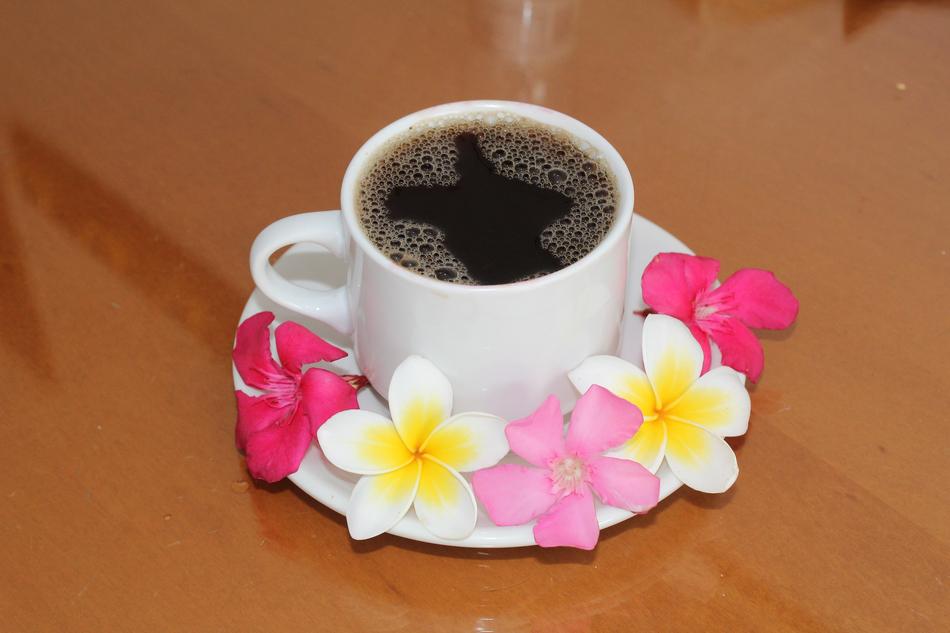 hot coffee mug decorated with flowers