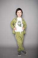 boy in green suit posing