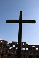 a big black cross against the sky