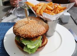 fried potatoes with a burger