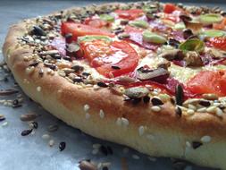 pizza with spices and vegetables