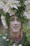 a beautiful wreath with a face view