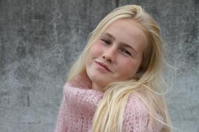 Young Girl Stylish in pink sweater