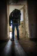 Man at Abandoned Door building
