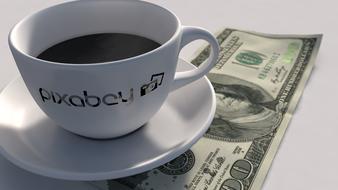 dollar bill under the mug