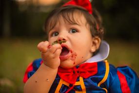 Child eating Fruit Strawberry