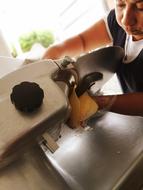 chef slices cheese