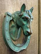 doorbell, bronze horse