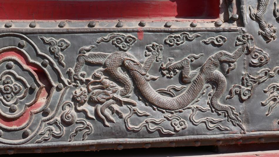 stone frame with dragon pattern