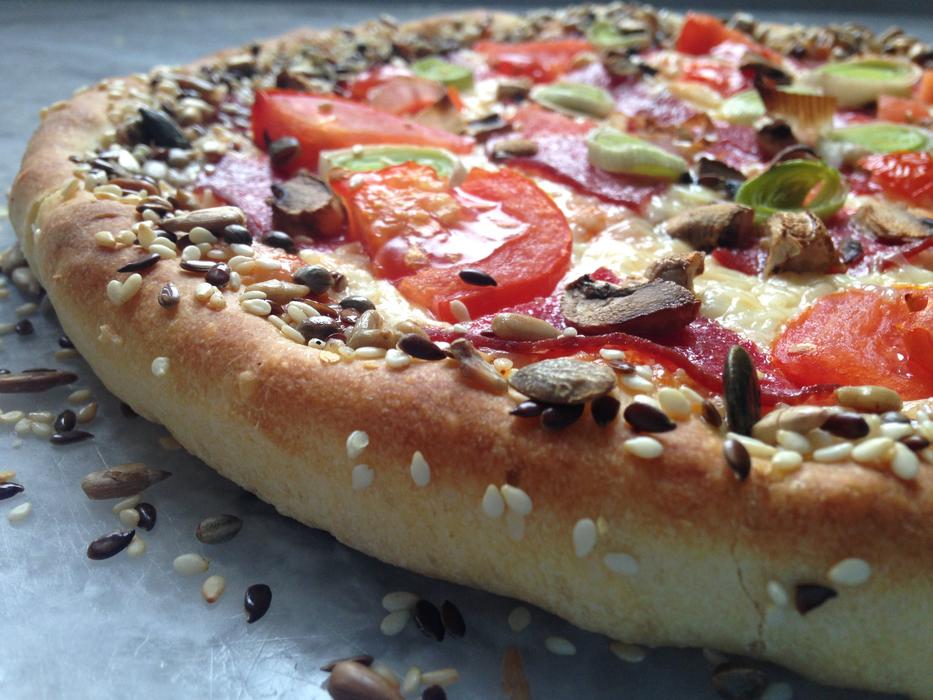 pizza with spices and vegetables