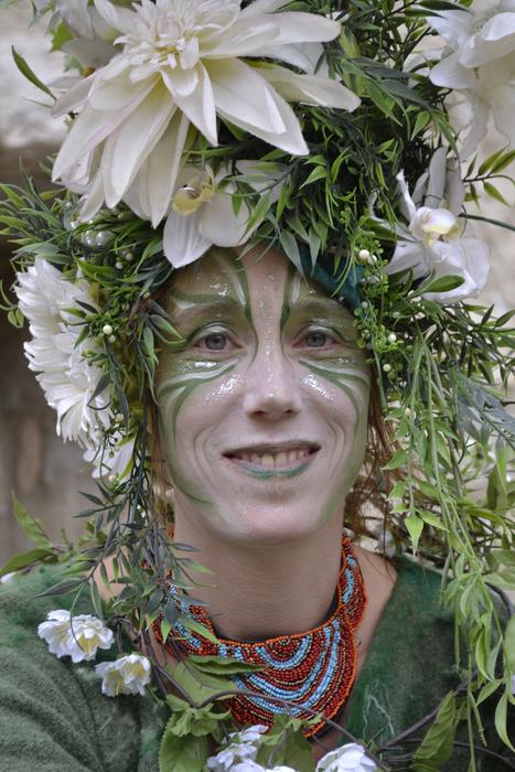 a beautiful wreath with a face view