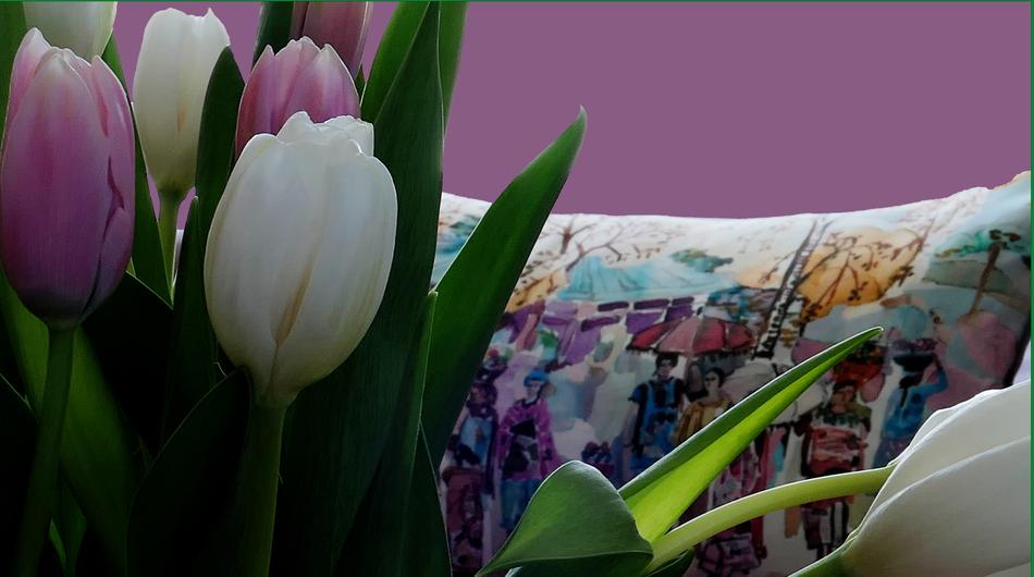 tulips by the bed in the room