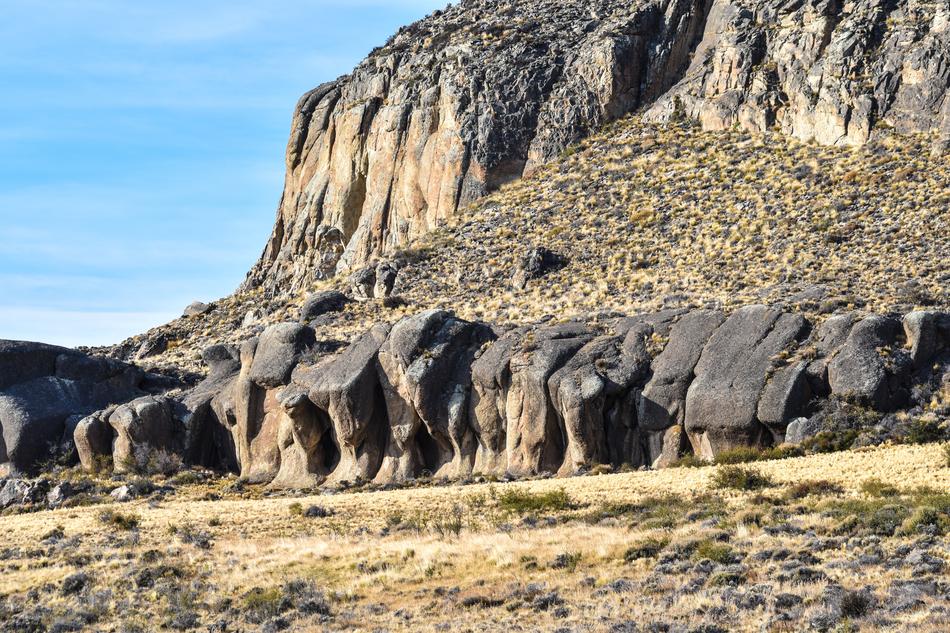 gorgeous rocks with dry grass