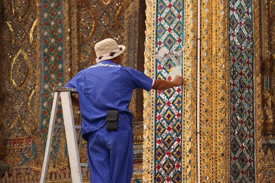 a man works in the temple