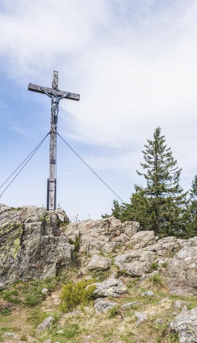 iron cross on stones