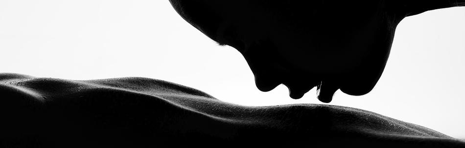 Black silhouette of the woman with open mouth, above the surface, at white background, clipart