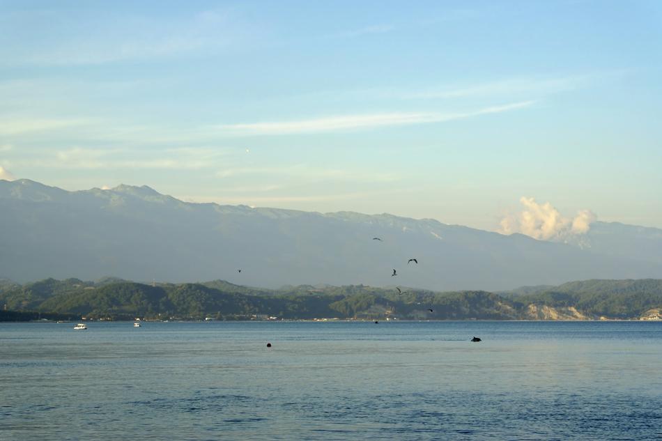 high mountain in front of the lake