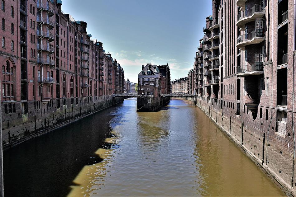 Canal with water running through the houses