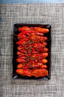 Juicy boiled crayfish on a plate