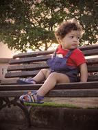 Child Human on bench in park