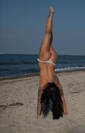Woman posing on sand Beach