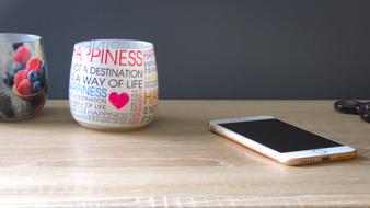 candlestick with quotes as a glass on the table